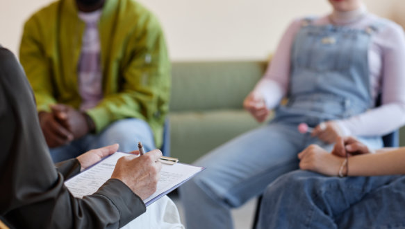 group of people having a counseling with psychiatrist