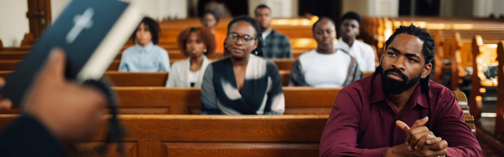 group of people listening to the sermon