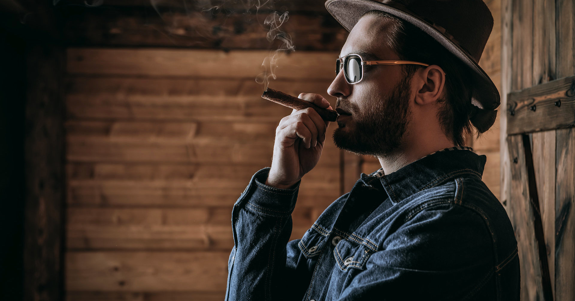 man is smoking cigar