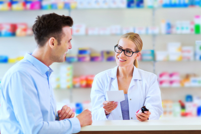 pharmacist and client at pharmacy