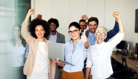 group of people cheering together