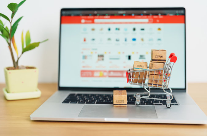 a laptop with small cart