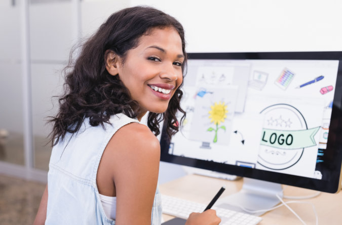 woman smiling while working