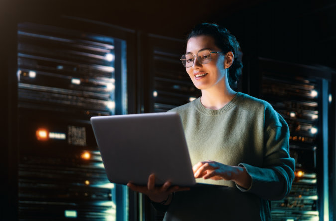 woman holding a laptop