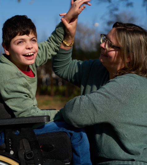 woman assist the little boy