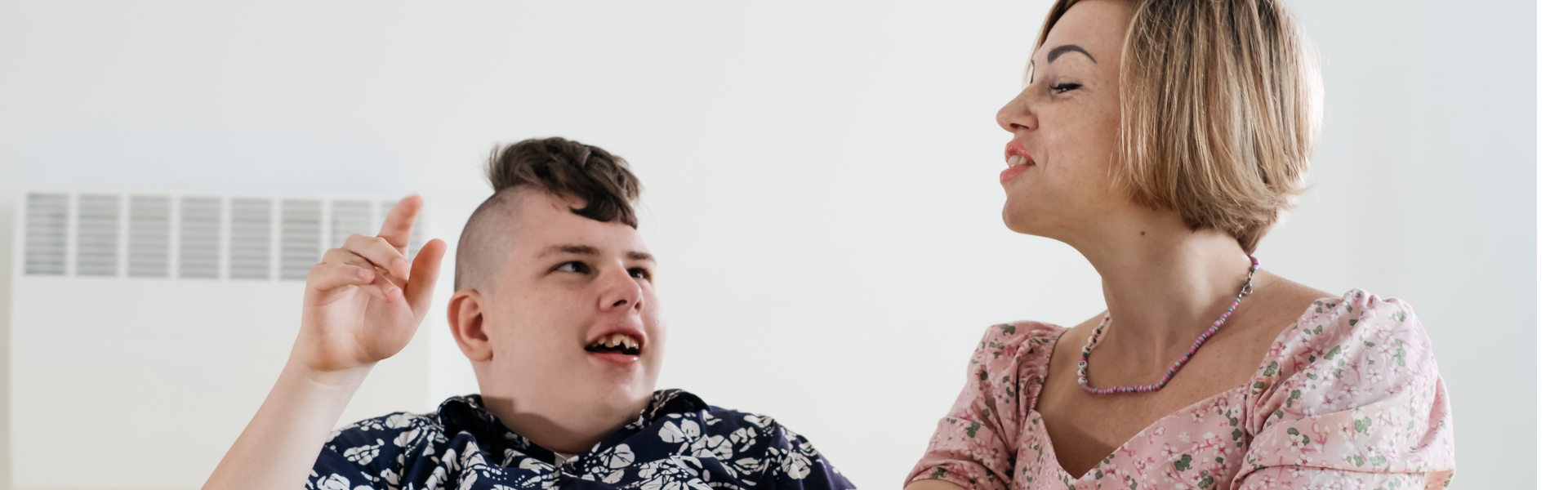 woman and little boy are having fun