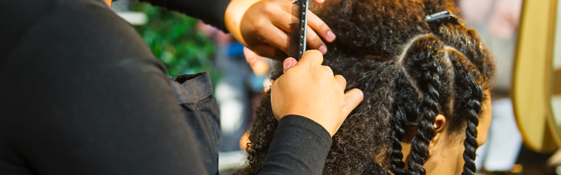 hairstylist braided hair of woman