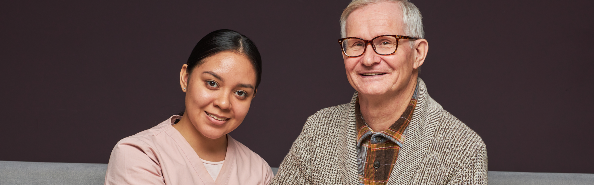 Female Caregiver with Elder man are happy