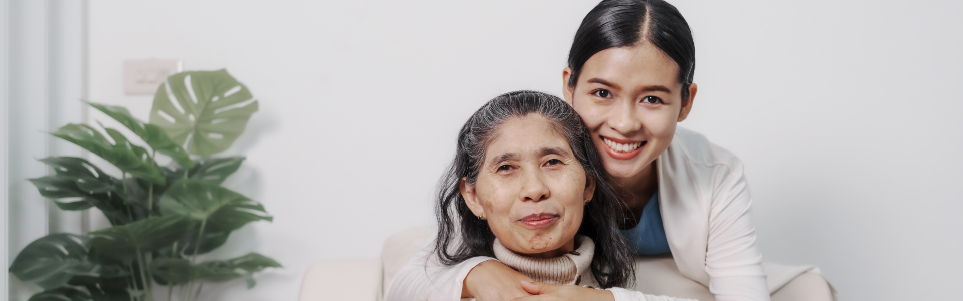 caregiver hug the old woman
